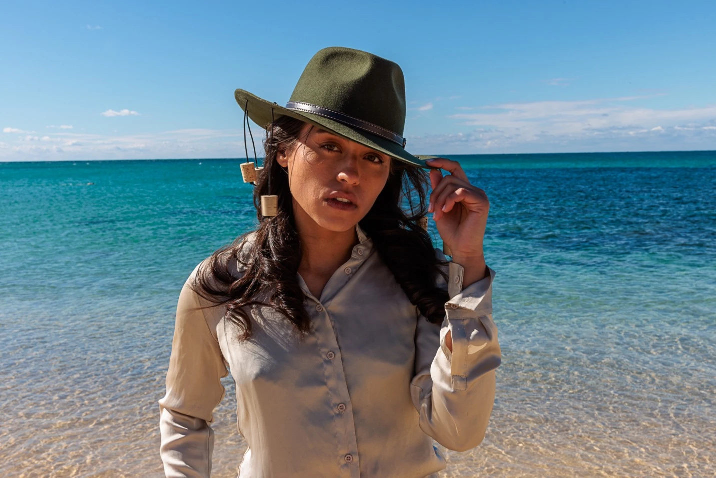 Women on a Beach Posing for a Picture Wearing Corker Hat